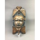A 20TH CENTURY AFRICAN CARVED WOOD WALL MASK