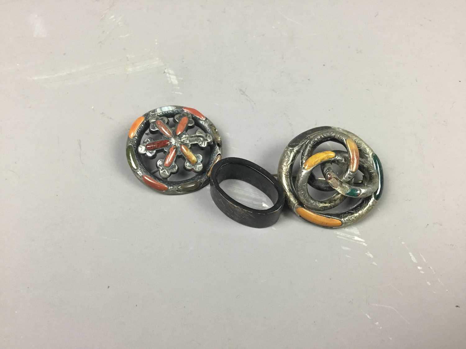A SCOTTISH AGATE SET BROOCH AND ANOTHER, ALSO A SCARF RING