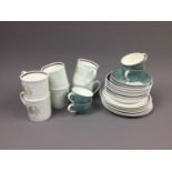 A SUSIE COOPER COFFEE SET, ALONG WITH ANOTHER