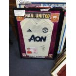 A FRAMED MANCHESTER UNITED F.C. JERSEY