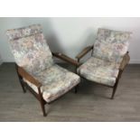 A NEAR PAIR OF RETRO ARMCHAIRS