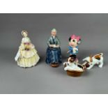 A ROYAL DOULTON FIGURE OF A PUPPY IN BASKET, ALONG WITH FOUR OTHER ROYAL DOULTON FIGURES