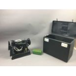 A SINGER 221K SEWING MACHINE AND A SEWING BOX