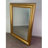A LARGE GILT MIRROR BY GALLERY