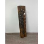 A HARDWOOD WALL MOUNTING WINE BOTTLE STAND