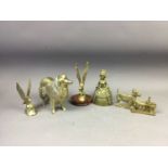 A LOT OF BRASS WARE INCLUDING BELLS AND WEIGHTS MODELLED AS ANIMALS AND GIRLS