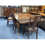 A MAHOGANY BREAKFORNT SIDEBOARD, DINING TABLE AND SIX CHAIRS