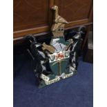 A RHODESIA INTEREST PAINTED CAST METAL CREST