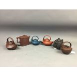 A GROUP OF SIX CHINESE YIXING TEAPOTS