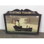 A HASTINGS FISHING CO ADVERTISEMENT BOARD AND A PAINTING OF NODDY