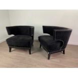A PAIR OF WINGBACK ARMCHAIRS