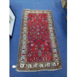 A MIDDLE EASTERN RUG