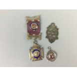 A SILVER MASONIC PENDANT, ANOTHER NEDAL AND A SILVER FOB