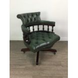 A GREEN LEATHER UPHOLSTERED SWIVEL CAPTAIN'S CHAIR