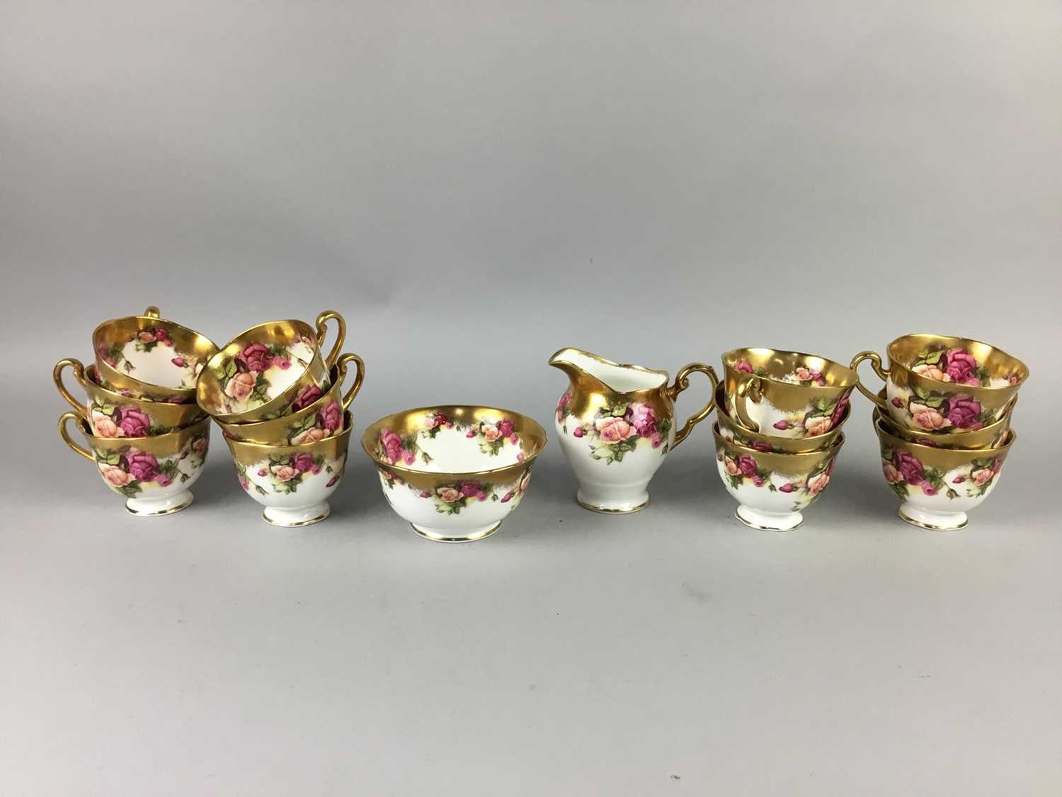 A ROYAL CHELSEA GOLDEN ROSE TEA SERVICE