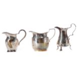 A GEORGE V SILVER CREAM JUG AND TWO OTHERS