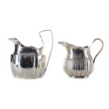 A LOT OF TWO IRISH SILVER CREAM JUGS