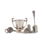 AN EARLY 20TH CENTURY SILVER TROPHY CUP ALONG WITH A RATTLE, A SCOOP AND A PURSE