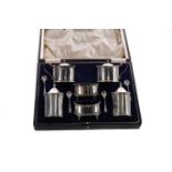 A CASED GEORGE VI SILVER SIX PIECE CRUET SET