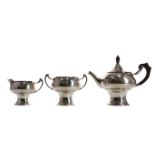 AN EDWARDIAN ART NOUVEAU SILVER BACHELOR'S THREE PIECE TEA SERVICE