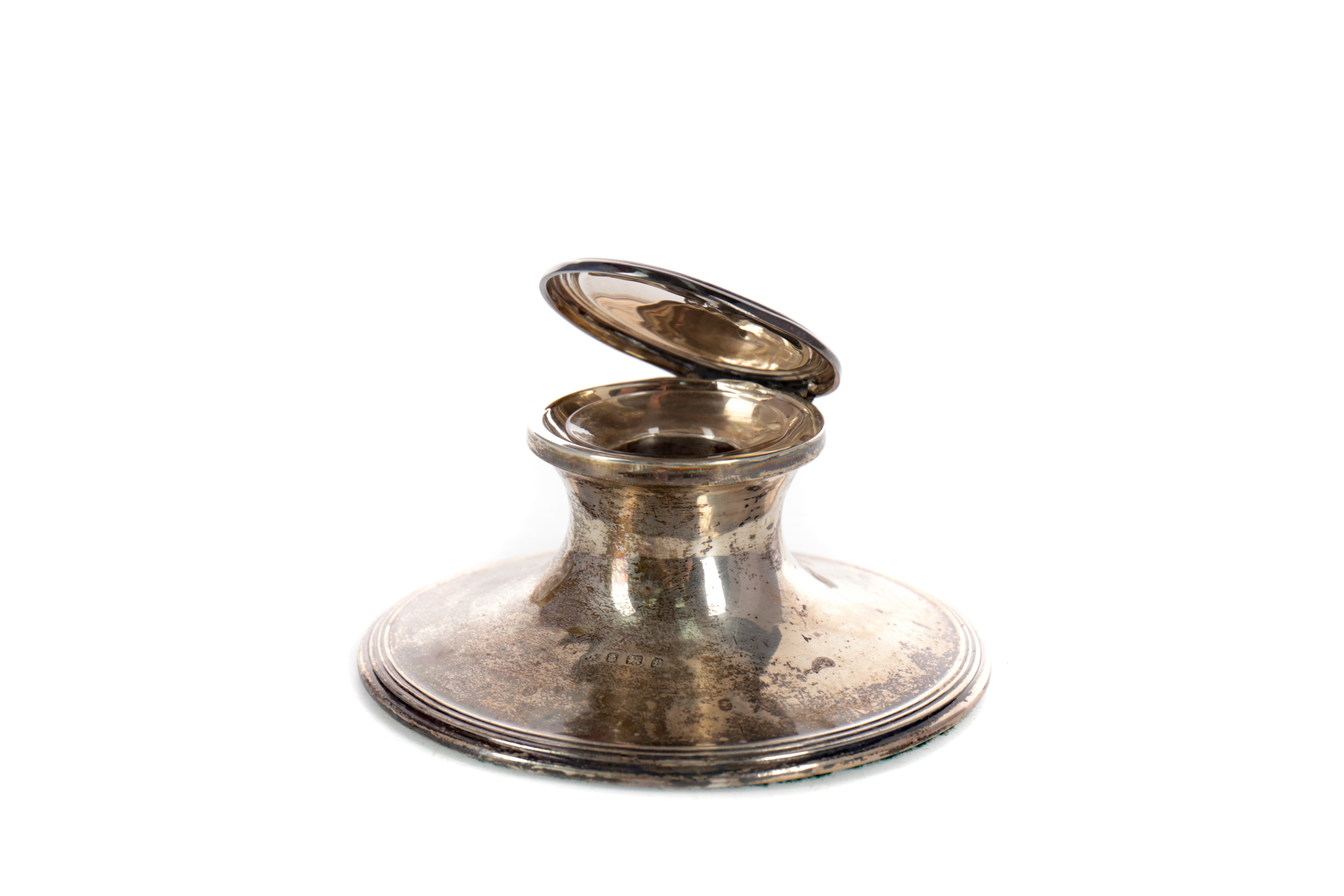 AN EDWARDIAN SILVER CAPSTAN INKWELL