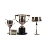 THREE EARLY 20TH CENTURY SILVER TROPHY CUPS, ALONG WITH A NAPKIN RING