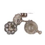 A LOT OF THREE SILVER TEA STRAINERS, AND A BONBON DISH