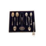 A CASED COMPOSITE SET OF APOSTLE SPOONS AND TONGS