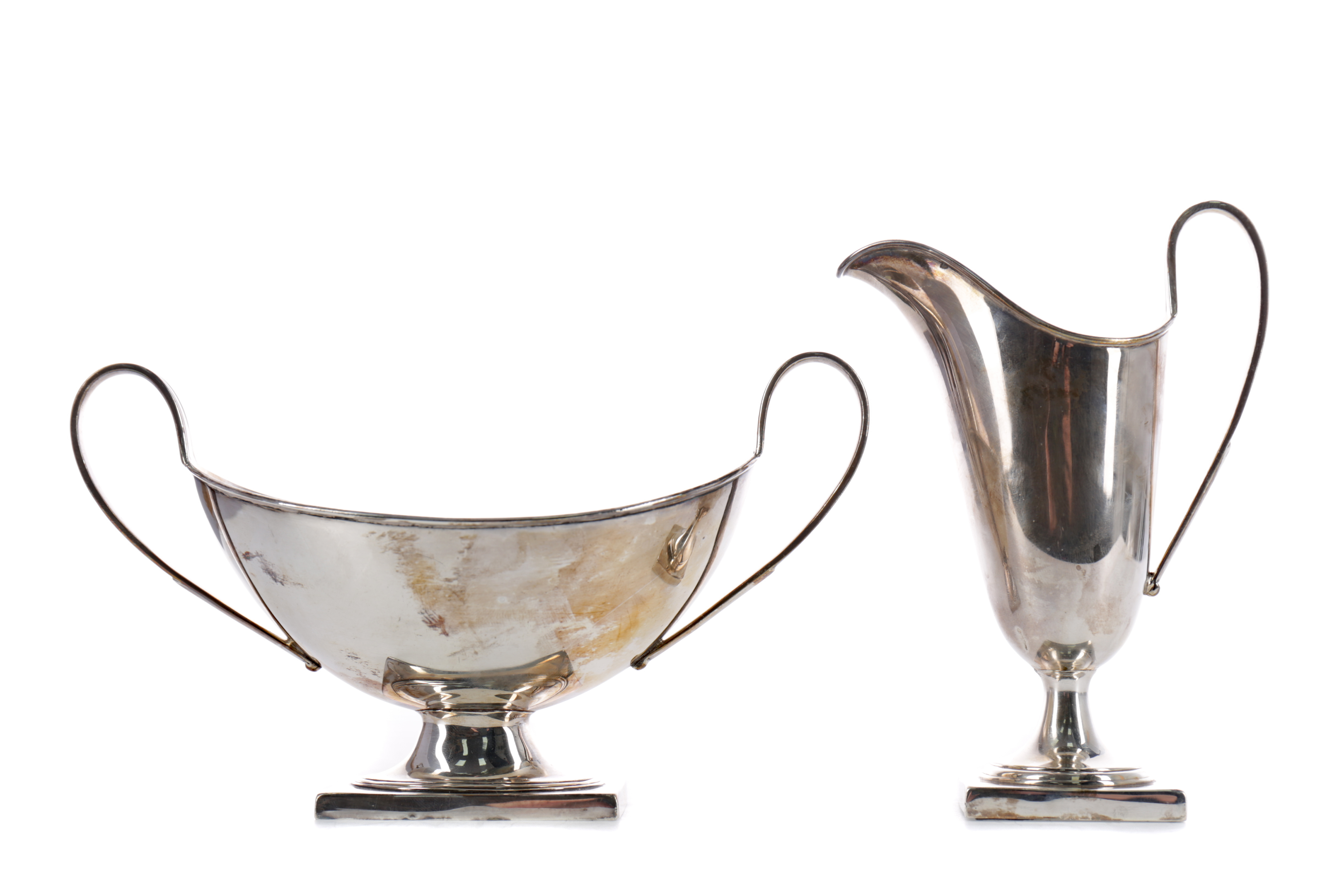 A CASED GEORGE V SILVER CREAM JUG AND SUGAR BOWL