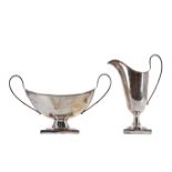 A CASED GEORGE V SILVER CREAM JUG AND SUGAR BOWL