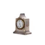 AN EARLY 20TH CENTURY SILVER CASED BEDSIDE TIMEPIECE