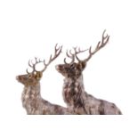 A FINE PAIR OF CAST SILVER FIGURES OF ROYAL STAGS