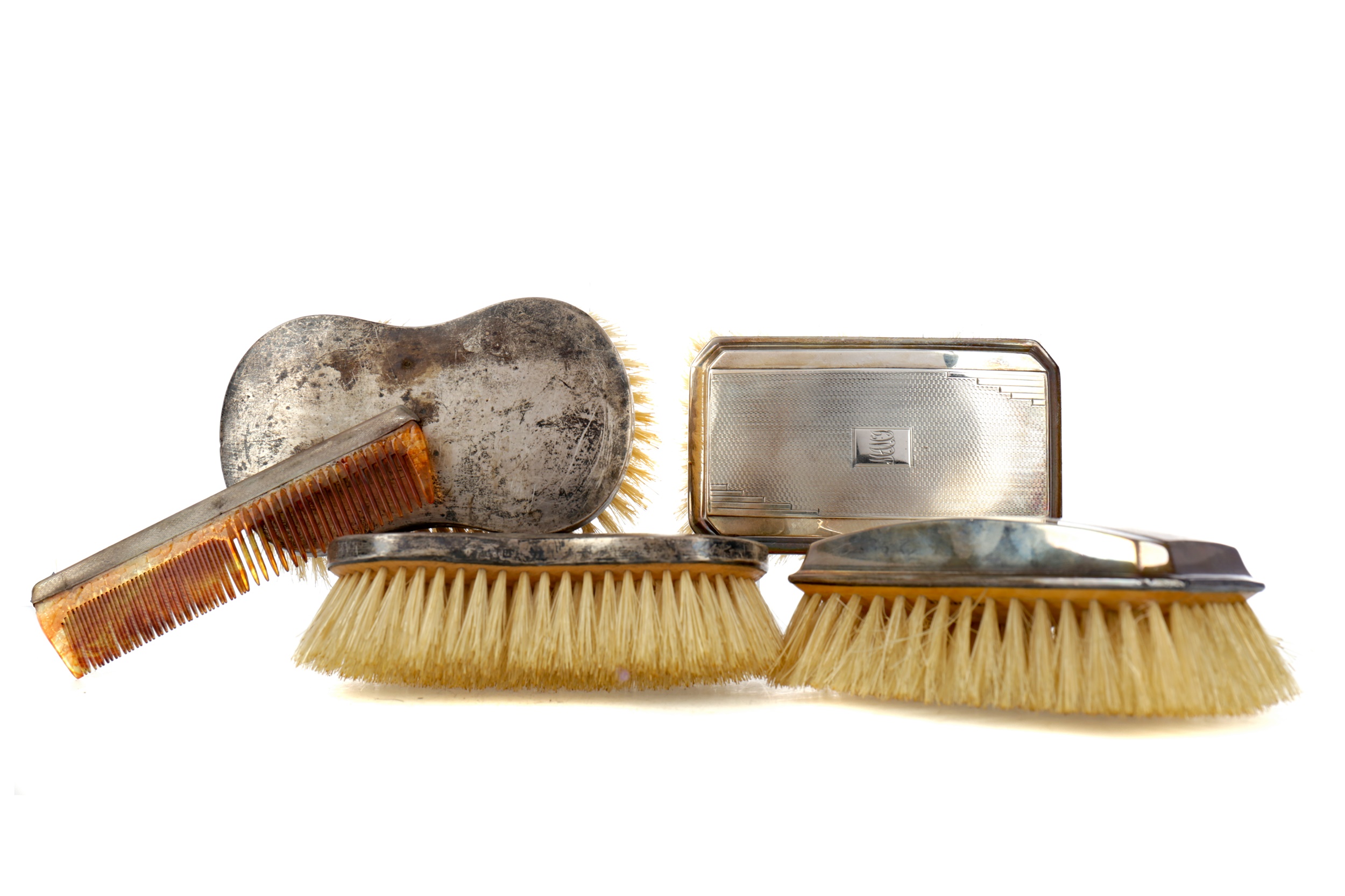 A CASED EARLY 20TH CENTURY SILVER BRUSH SET AND TWO OTHERS