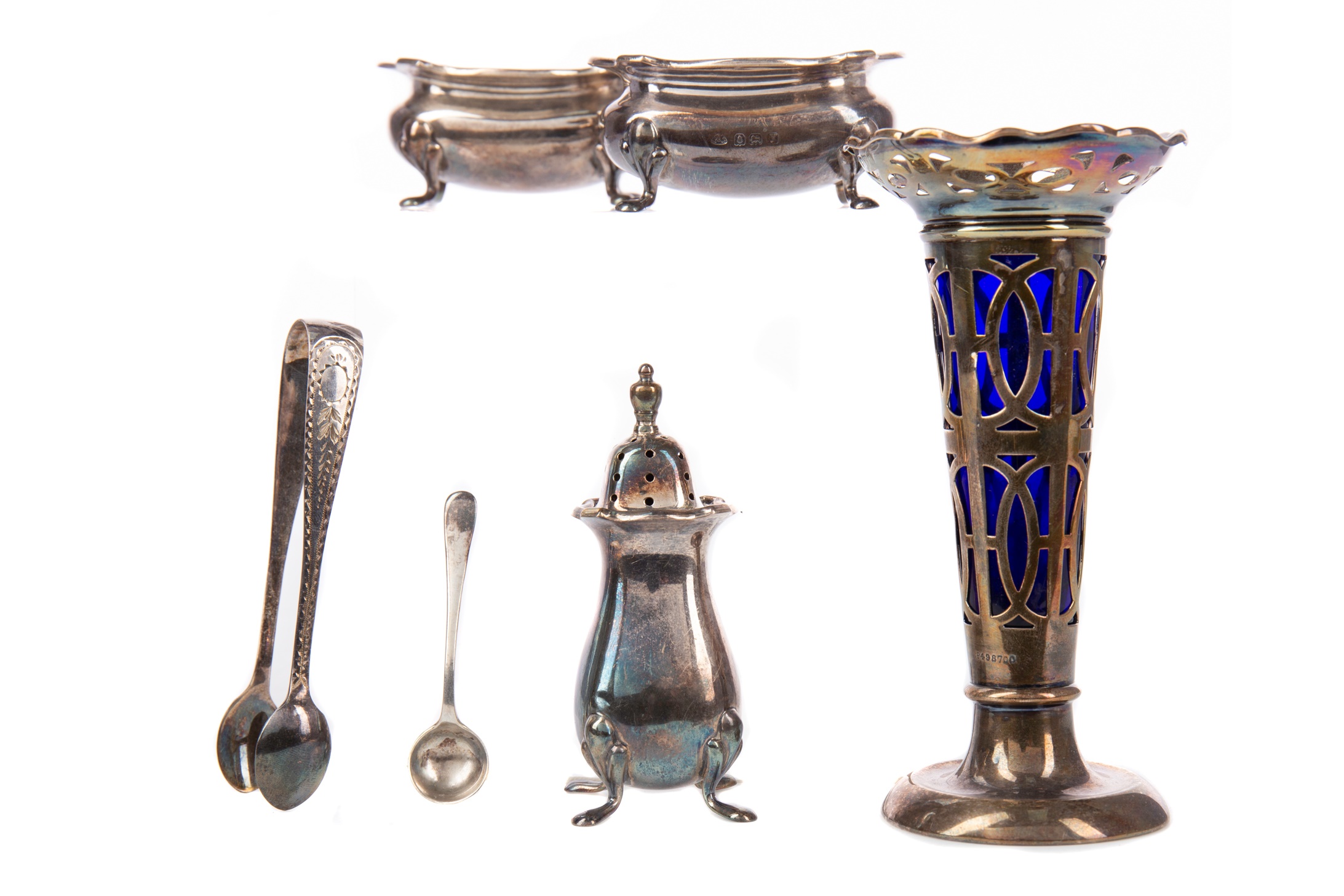 A SET OF FOUR SILVER NAPKIN RINGS AND OTHER ITEMS