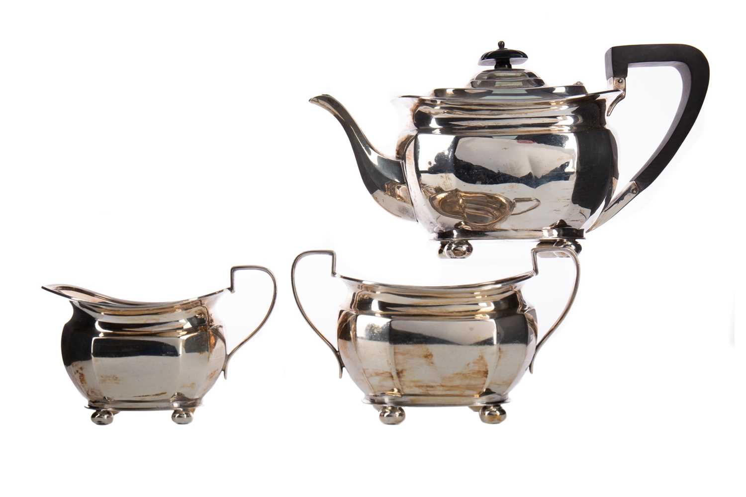 A GEORGE V SILVER THREE PIECE TEA SERVICE