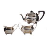 A GEORGE V SILVER THREE PIECE TEA SERVICE