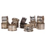 A COLLECTION OF TWELVE SILVER NAPKIN RINGS