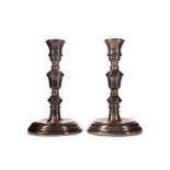 A PAIR OF ELIZABETH II SILVER TABLE CANDLESTICKS