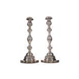 A PAIR OF GEORGE V SILVER JUDAIC SABBATH DAY CANDLESTICKS