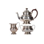 A GEORGE V SILVER THREE PIECE TEA SERVICE