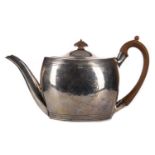 A GEORGE III SILVER TEAPOT