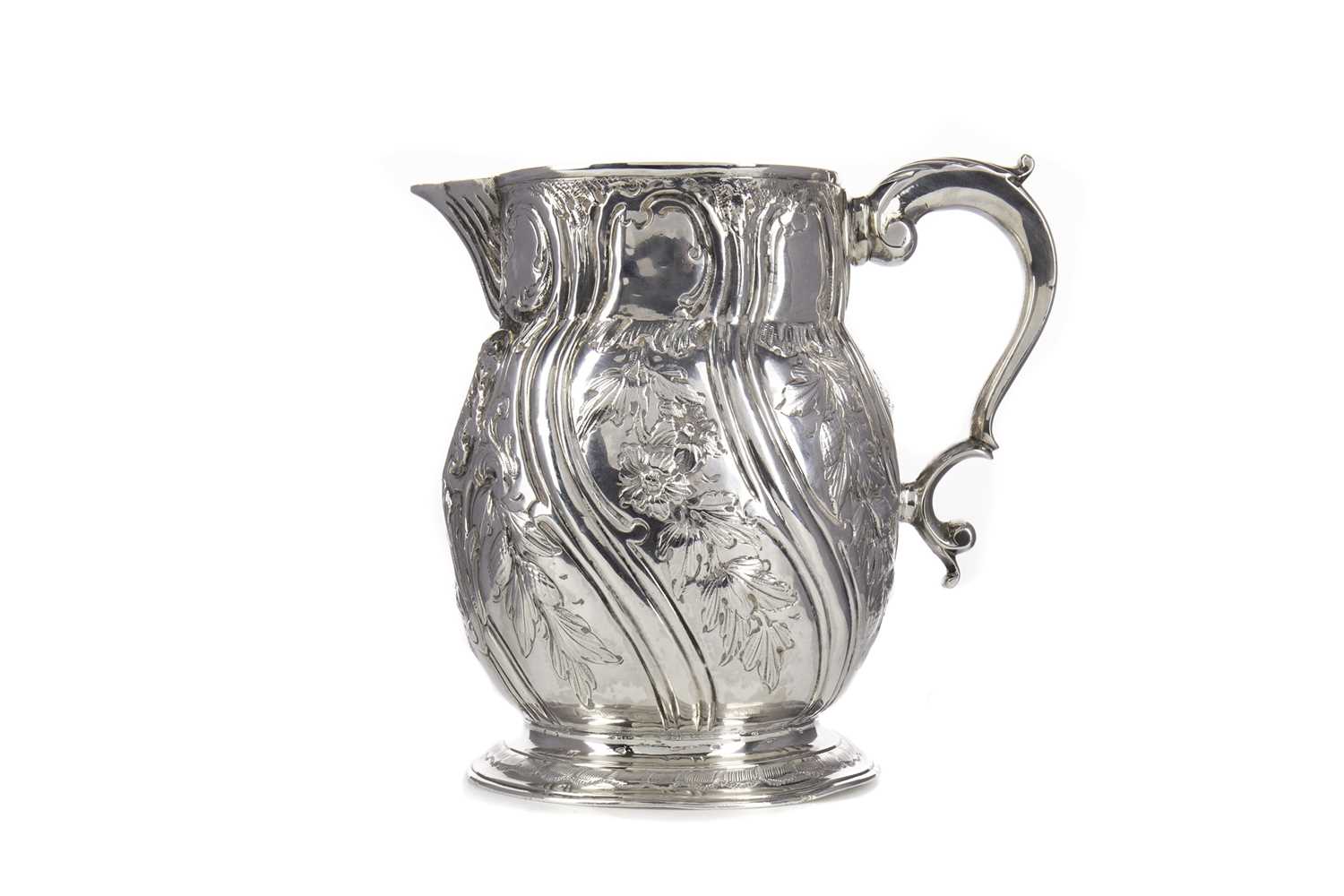 A GEORGE II SILVER BEER JUG