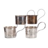 A SET OF FOUR GEORGE V SILVER CUPS
