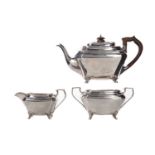 A GEORGE V SILVER THREE PIECE TEA SERVICE