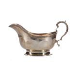 A GEORGE V SCOTTISH SILVER SAUCE BOAT