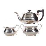 A GEORGE V SILVER THREE PIECE TEA SERVICE