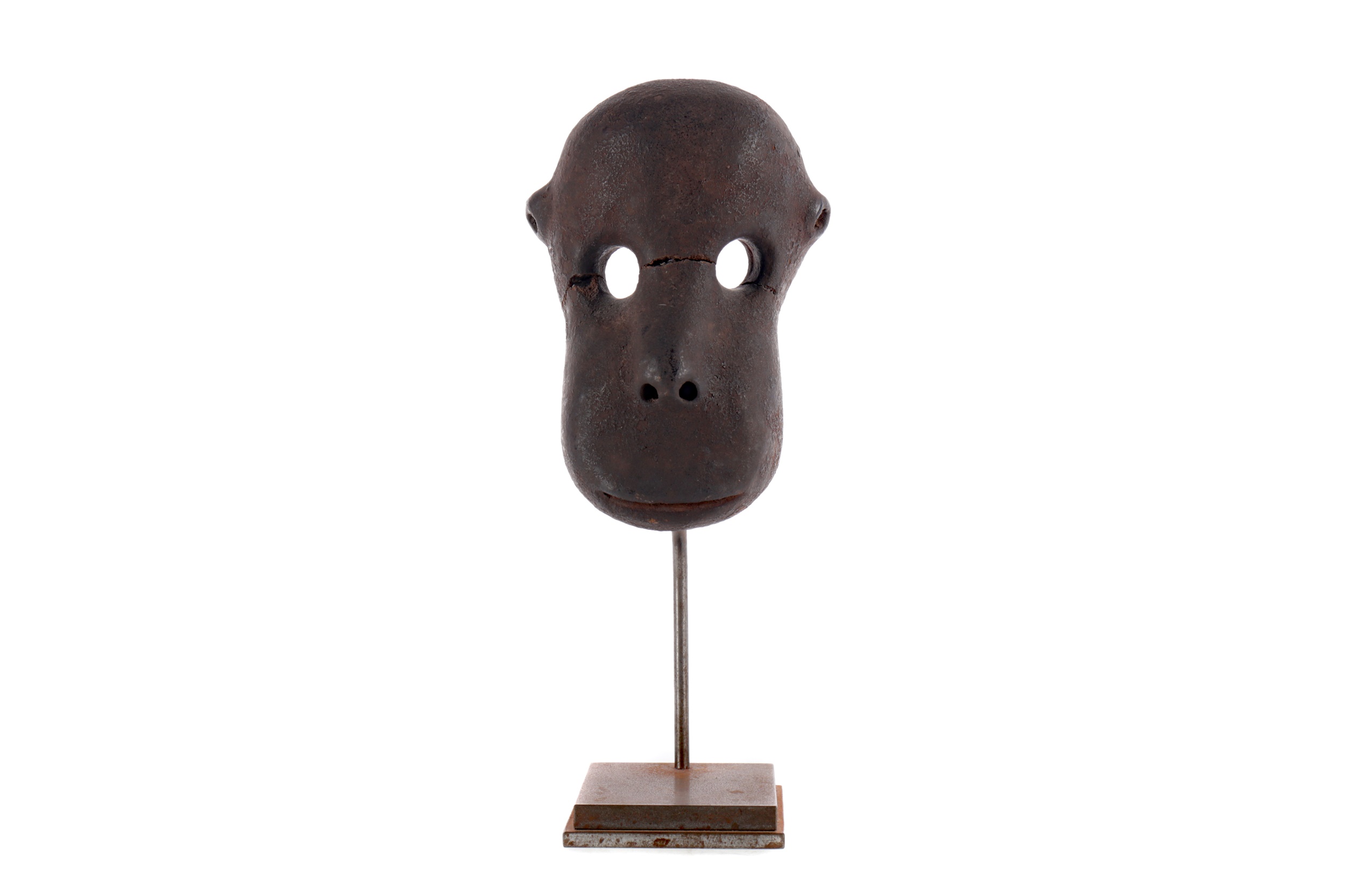 AN AFRICAN POTTERY MODEL OF A MONKEY FACE