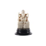 A LATE 19TH/EARLY 20TH CENTURY INDIAN CARVED IVORY FIGURE OF SHIVA