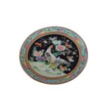 AN EARLY 20TH CENTURY CHINESE CIRCULAR PLAQUE