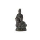 AN EASTERN BRONZE FIGURE OF GUANYIN